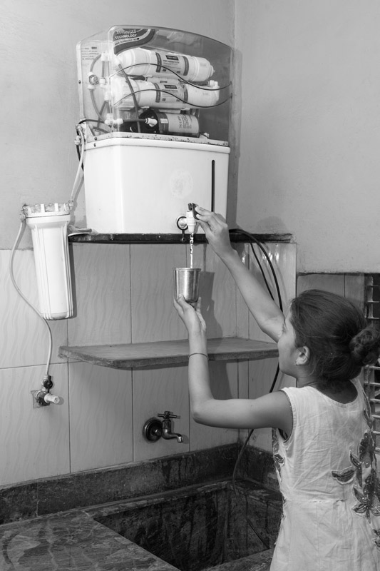 Industry and Violation of Human Right to Water - RO unit at home used for purifying the supply water in Bichhadi, Udaipur district, Rajasthan